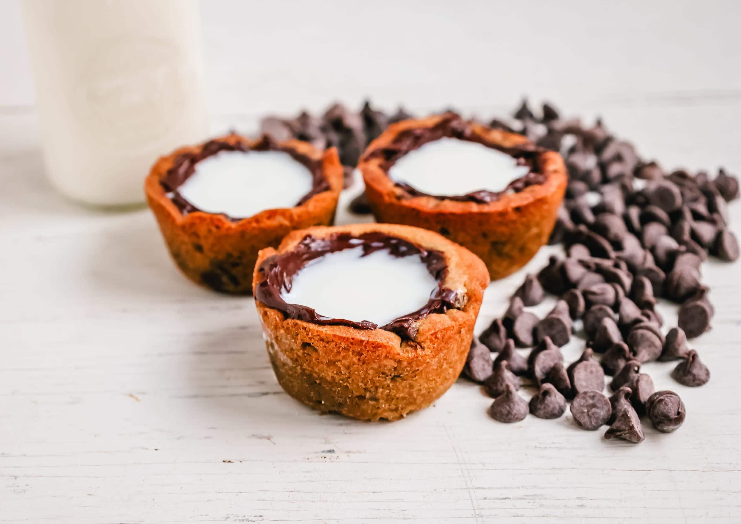Milk and Cookie Shots The famous Milk and Cookie Shots were made famous at New York City Dominique Ansel Bakery. This soft chocolate chip cookie is shaped into a shot, baked until warm and gooey, lined with chocolate, and served with milk inside. If you love cookies and milk, this is the dessert for you!