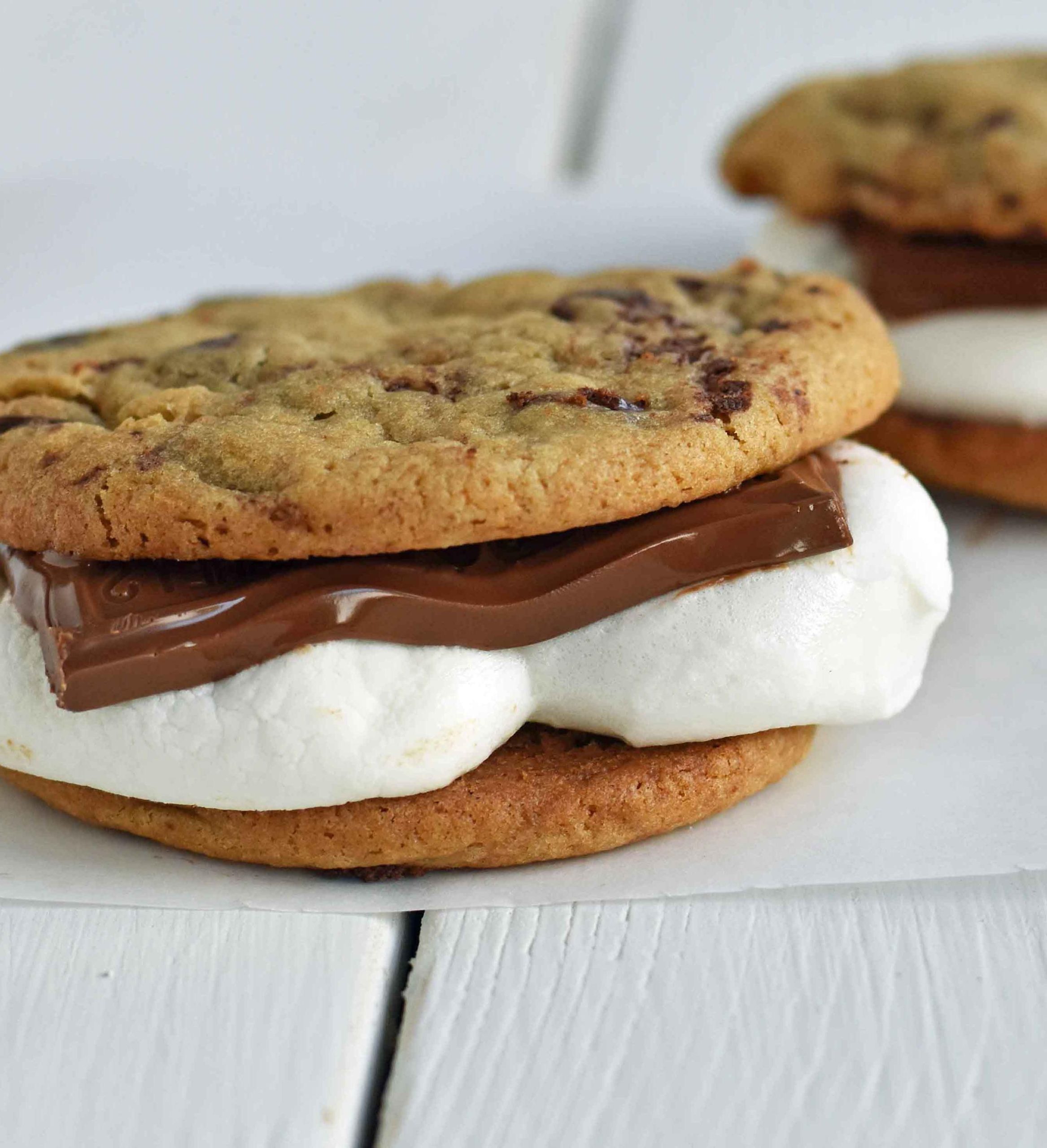 Chocolate Chip Cookie S'mores. Warm, homemade chocolate chip cookies sandwiched with melted toasted marshmallow and rich milk chocolate. The ultimate s'mores. www.yamne.com