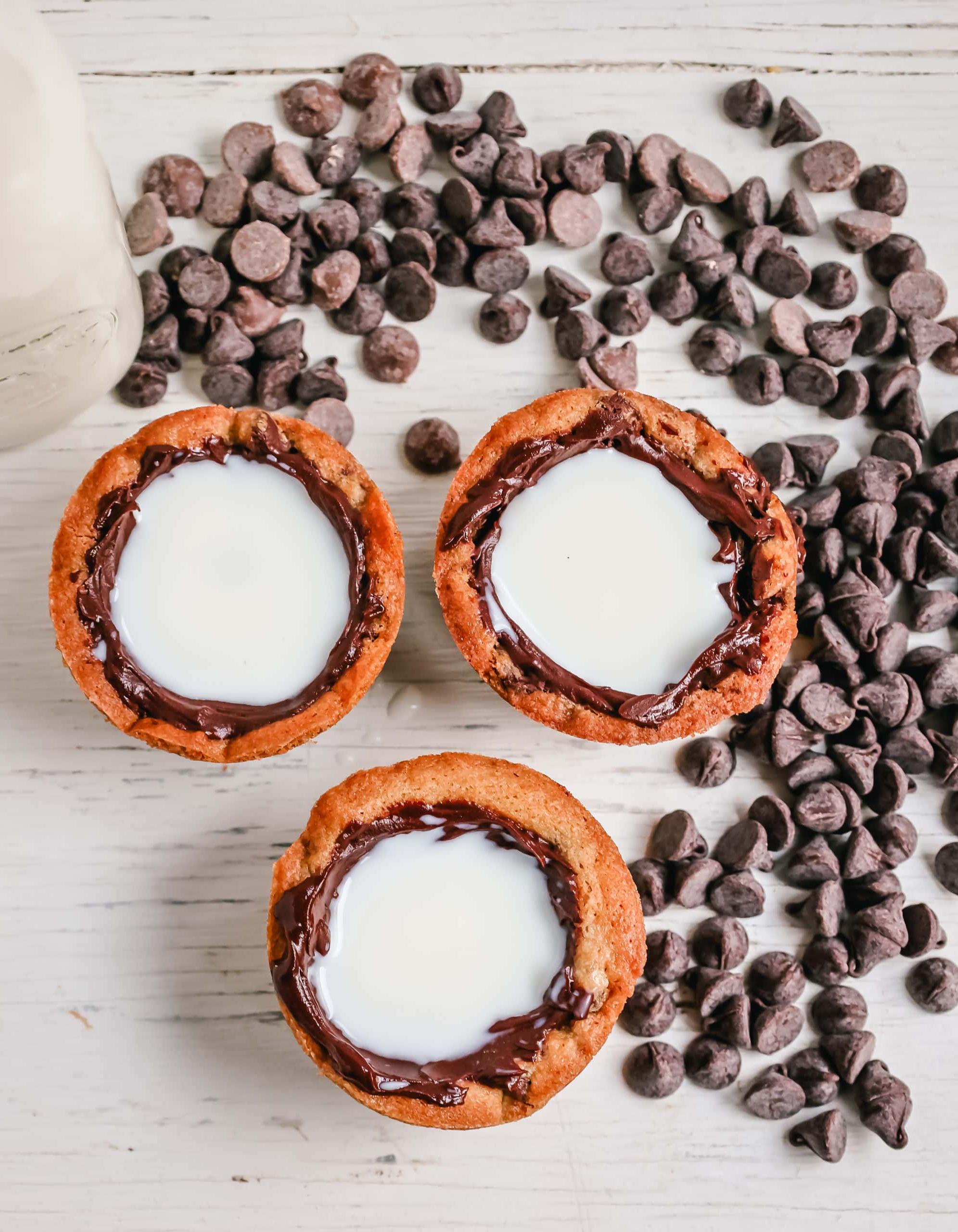 Milk and Cookie Shots The famous Milk and Cookie Shots were made famous at New York City Dominique Ansel Bakery. This soft chocolate chip cookie is shaped into a shot, baked until warm and gooey, lined with chocolate, and served with milk inside. If you love cookies and milk, this is the dessert for you!