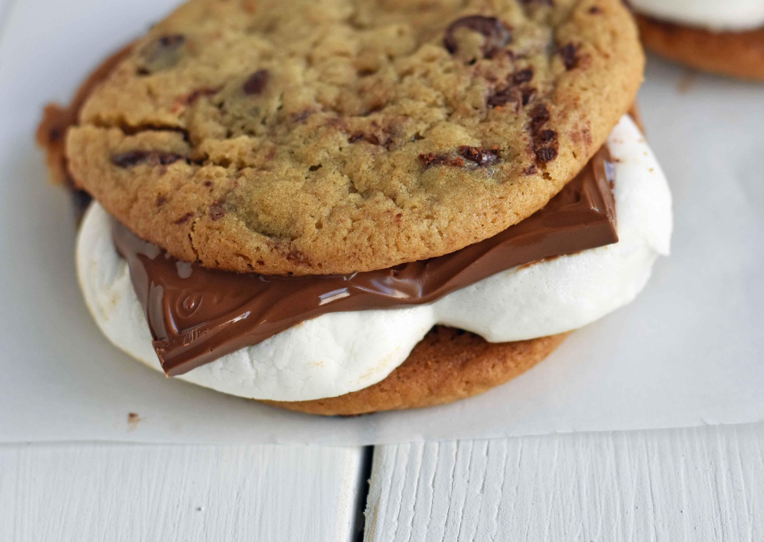 Chocolate Chip Cookie S'mores. Warm, homemade chocolate chip cookies sandwiched with melted toasted marshmallow and rich milk chocolate. The ultimate s'mores. www.yamne.com
