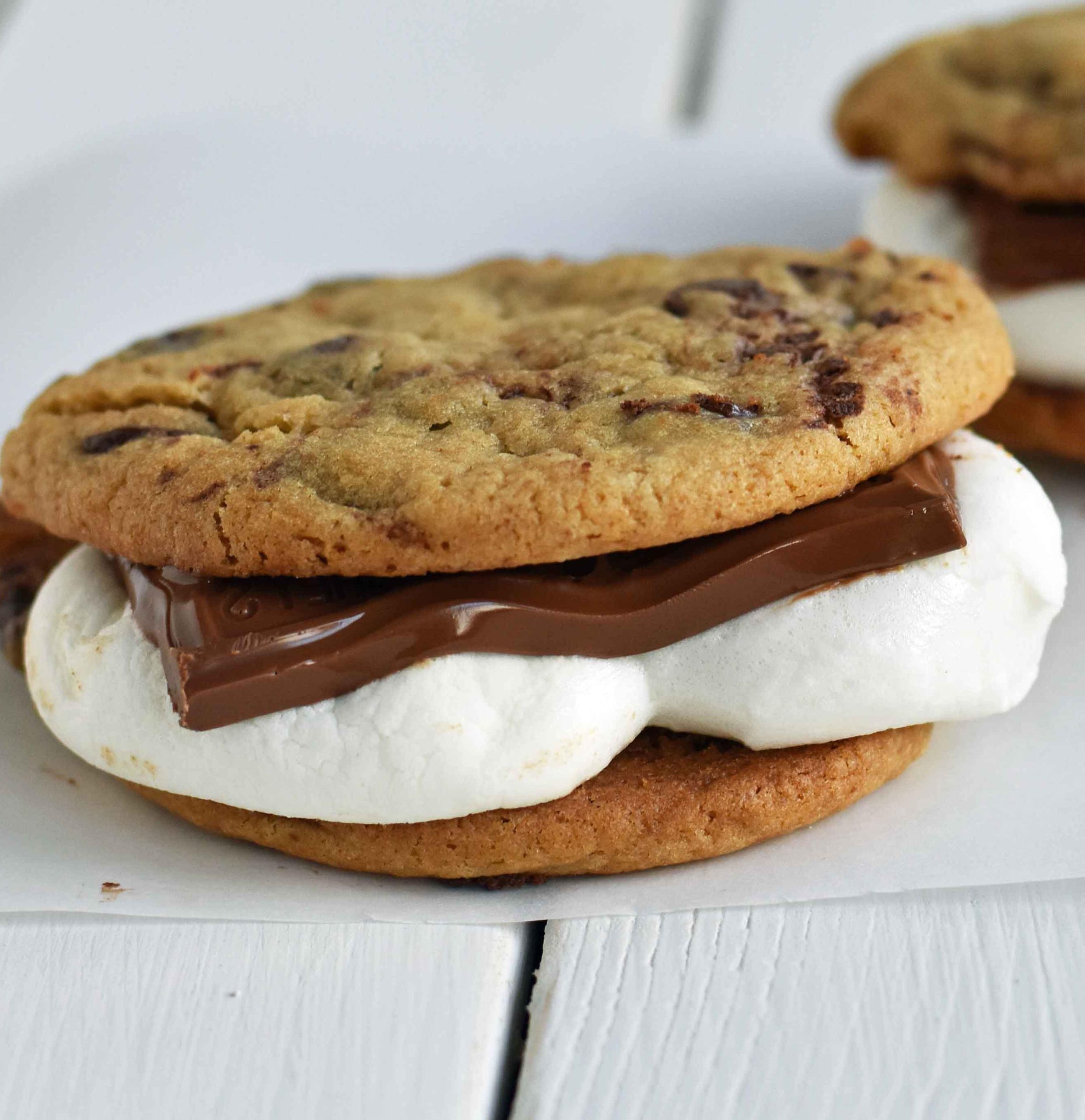Chocolate Chip Cookie S'mores. Warm, homemade chocolate chip cookies sandwiched with melted toasted marshmallow and rich milk chocolate. The ultimate s'mores. www.yamne.com