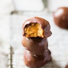 Vegan Chocolate Covered Peanut Butter Balls - Running on Real Food