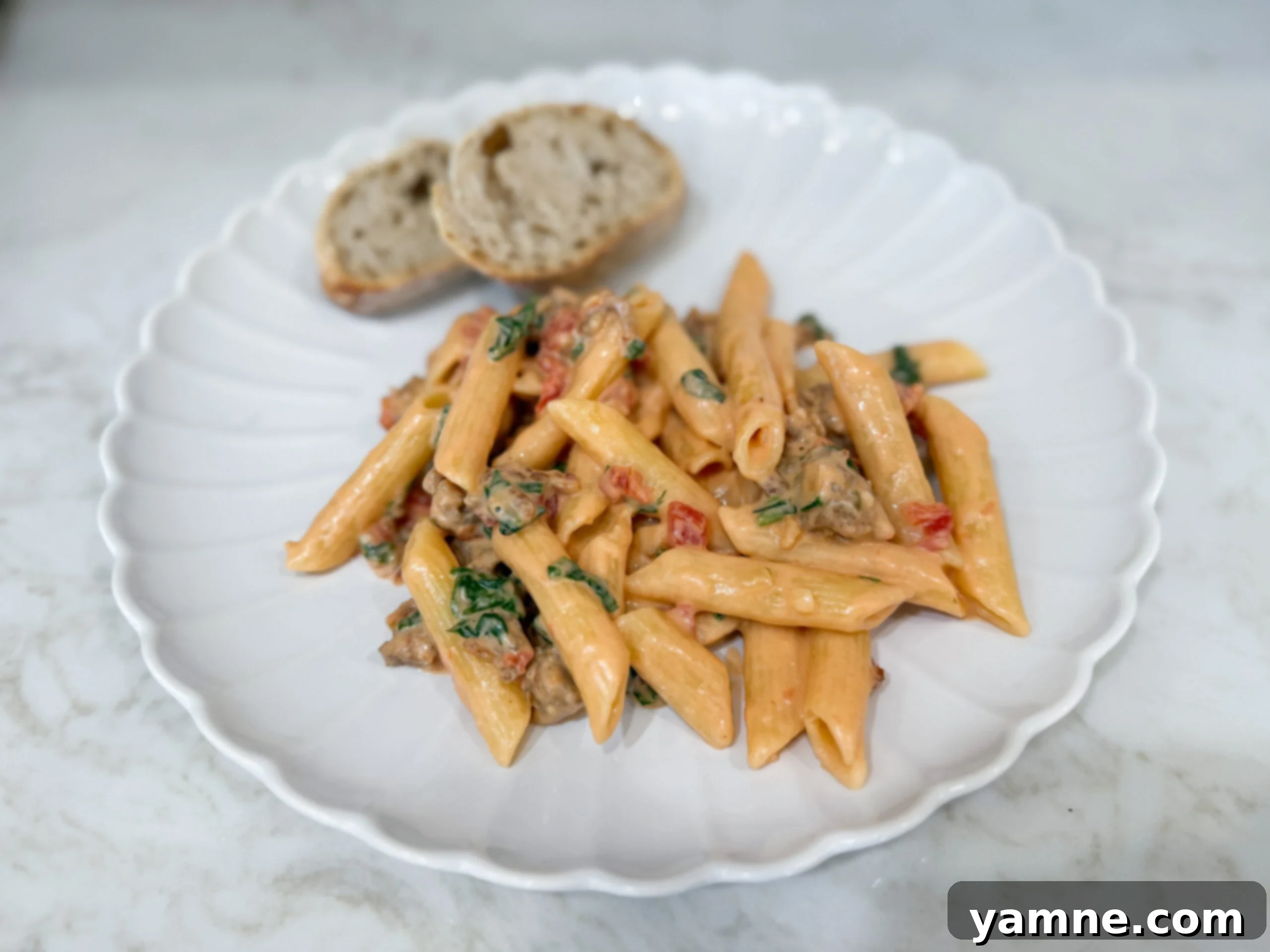 Italian Sausage Pasta in a Silky Cream Sauce 1 featured 25898