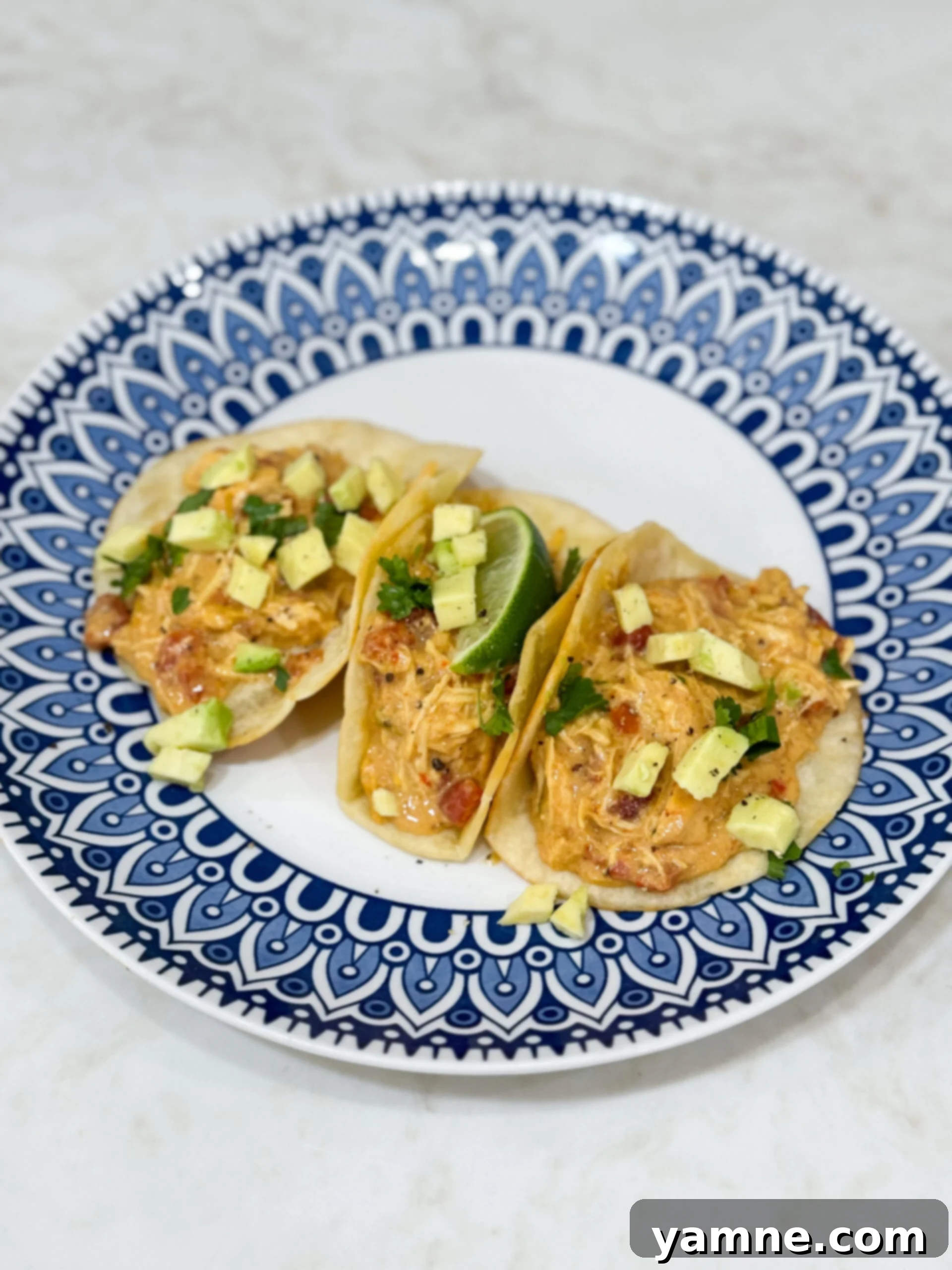 Creamy Slow Cooker Queso Chicken Tacos 1 featured 8268