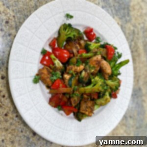 Delicious and healthy seasoned chicken and vegetable skillet, ready to serve.