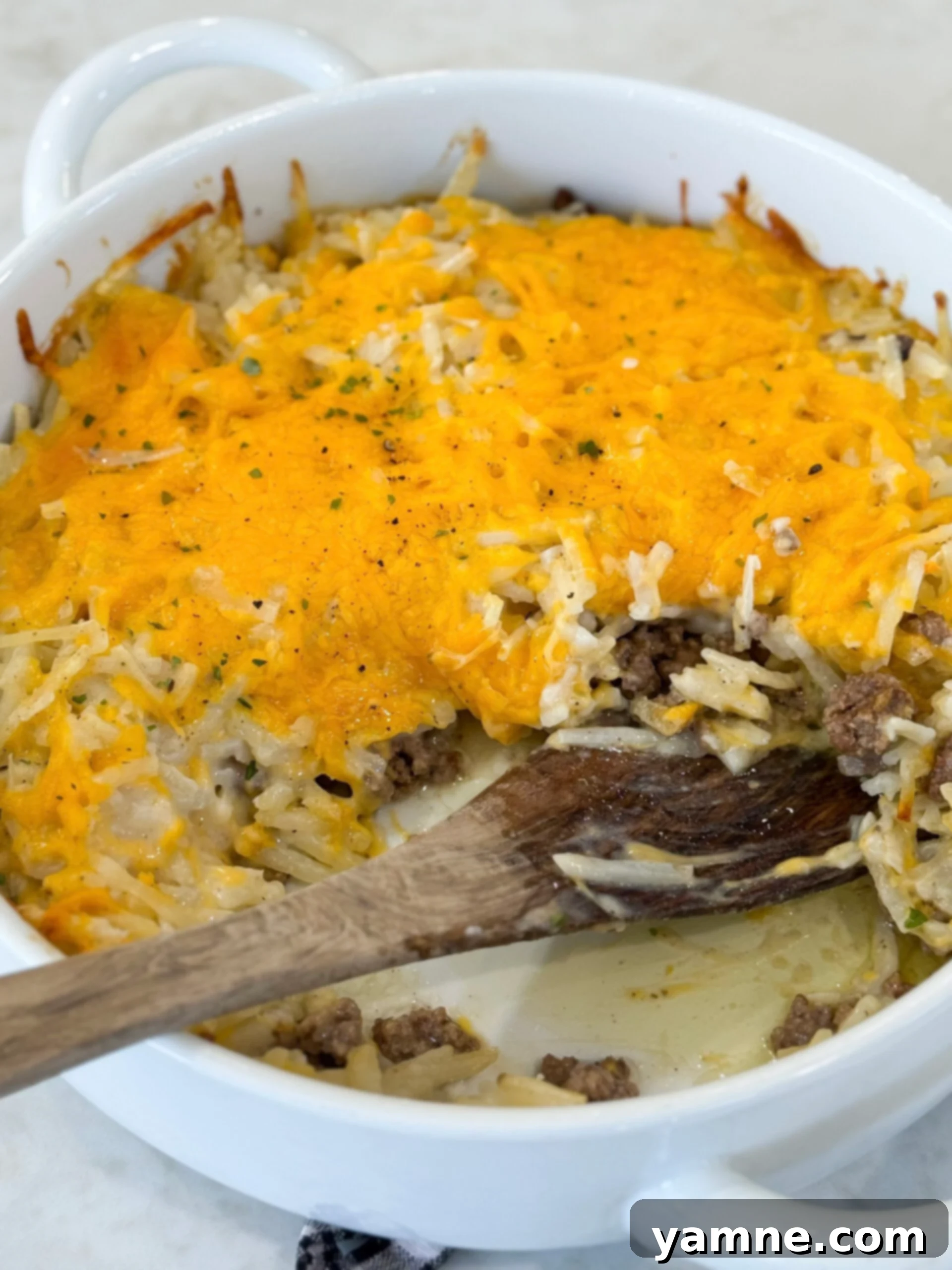 Golden baked hashbrown hamburger casserole
