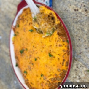 Grandma's Chicken Casserole 2 A golden-brown Classic Chicken Casserole, served in a round baking dish