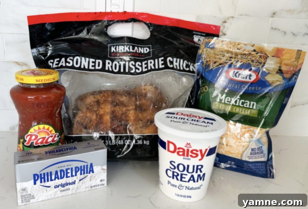 Crispy Cheesy Chicken Taquitos 2 cheesy chicken taquitos ingredients spread out for cooking