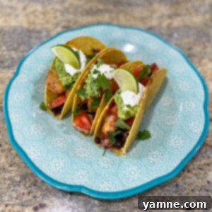 Crispy Baked Chicken Tacos 2 Delicious Baked Chicken Tacos with a crispy shell and melted cheese