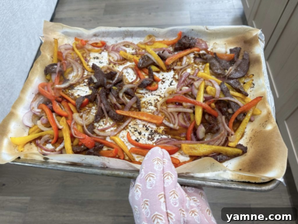 Cooked sheet pan steak fajitas ready to serve