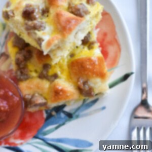 Hearty Biscuit Breakfast Bake 2 Breakfast Biscuit Casserole with savory sausage and fluffy eggs
