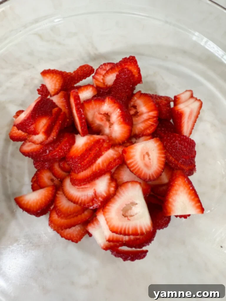 Sliced fresh strawberries for a vibrant fruit salad