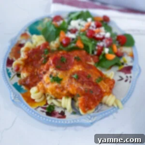 Delicious and cheesy Pizza Pasta Bake, bubbling hot from the oven with pepperoni on top.