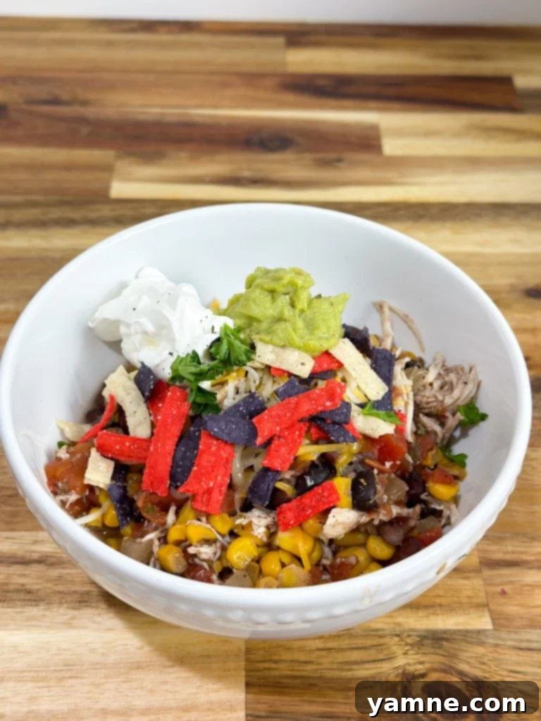 easy slow cooker chicken burrito bowl with fresh ingredients