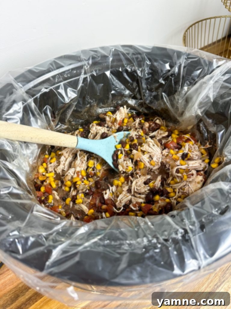 finished easy slow cooker chicken burrito bowl ready to serve