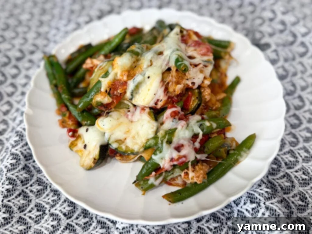 Healthy Turkey and Veggie Skillet 11 Top-down view of a cooked low-carb turkey zucchini skillet in a pan