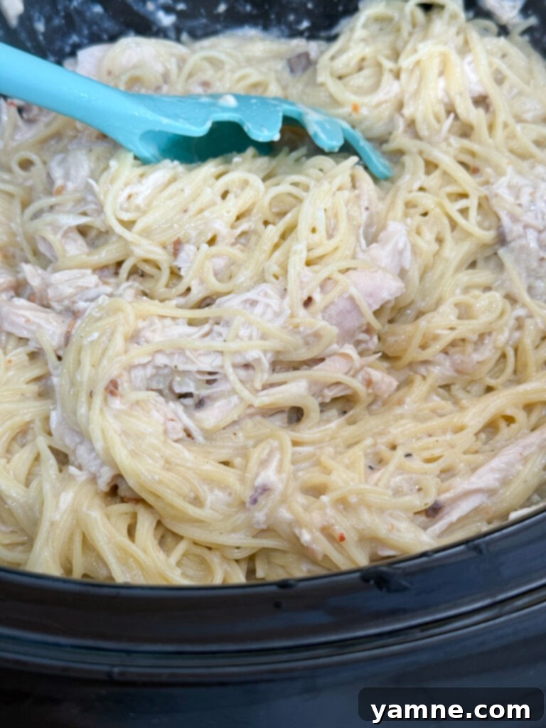 Add pasta to creamy chicken pasta
