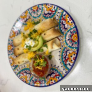 Crispy Baked Chicken Ranch Flautas with creamy ranch chicken filling