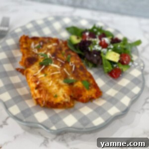 Golden Baked Manicotti 2 Baked manicotti in a baking dish