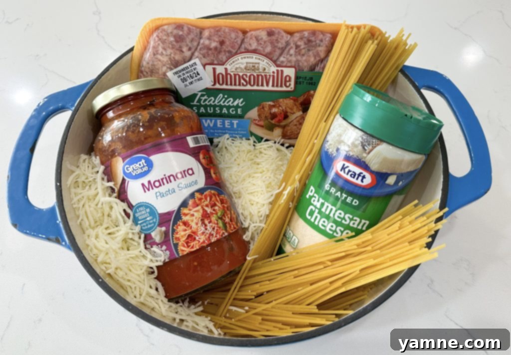 Simple ingredients for quick one-pot spaghetti with sausage.