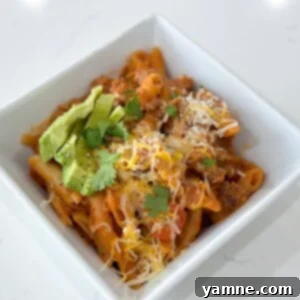 Finished One-Pot Ground Turkey Pasta dish with fresh cilantro garnish.