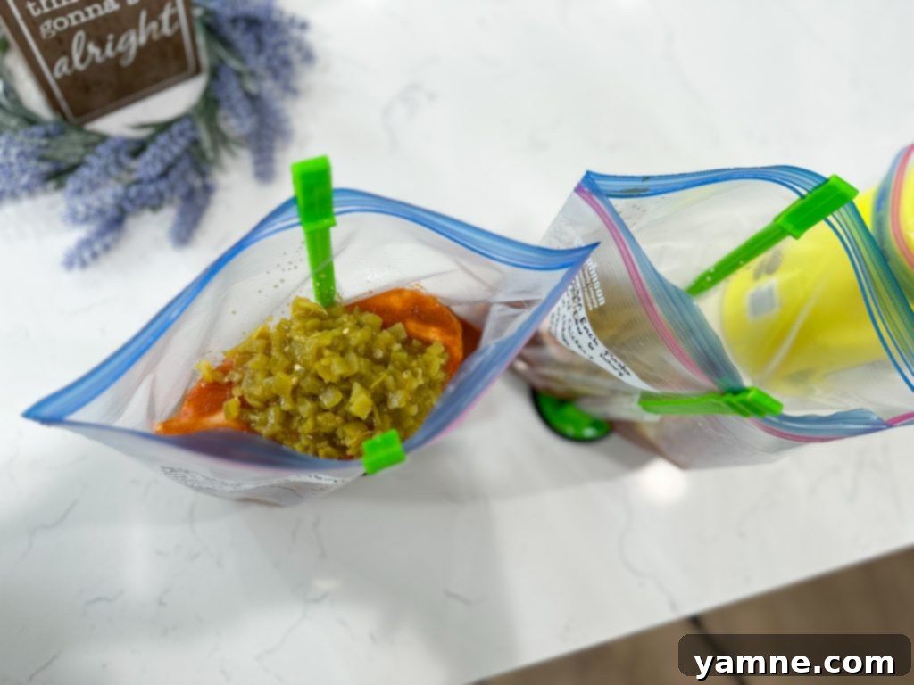 Cheesy Crockpot Enchilada Pasta 6 A prepared serving of slow cooker chicken enchilada pasta, ready to enjoy.