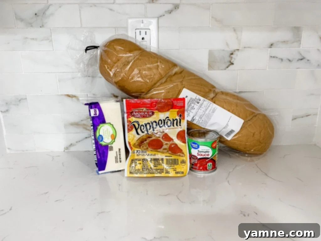 Crispy French Bread Pizzas 2 Crispy French Bread Pizzas loaded with cheese and toppings, ready to eat