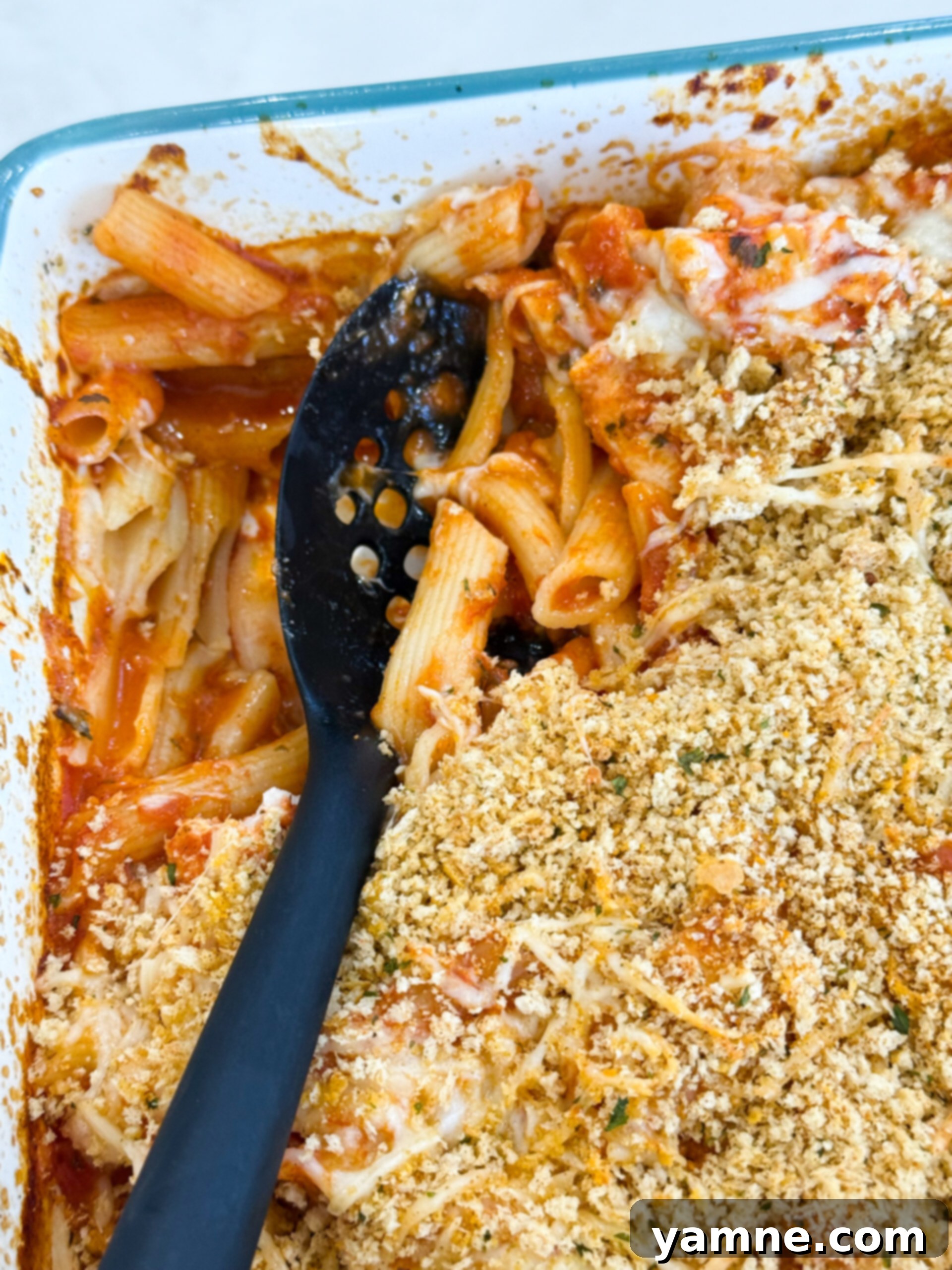 Cheesy Chicken Parm Bake 7 Golden baked chicken parmesan casserole with crispy topping