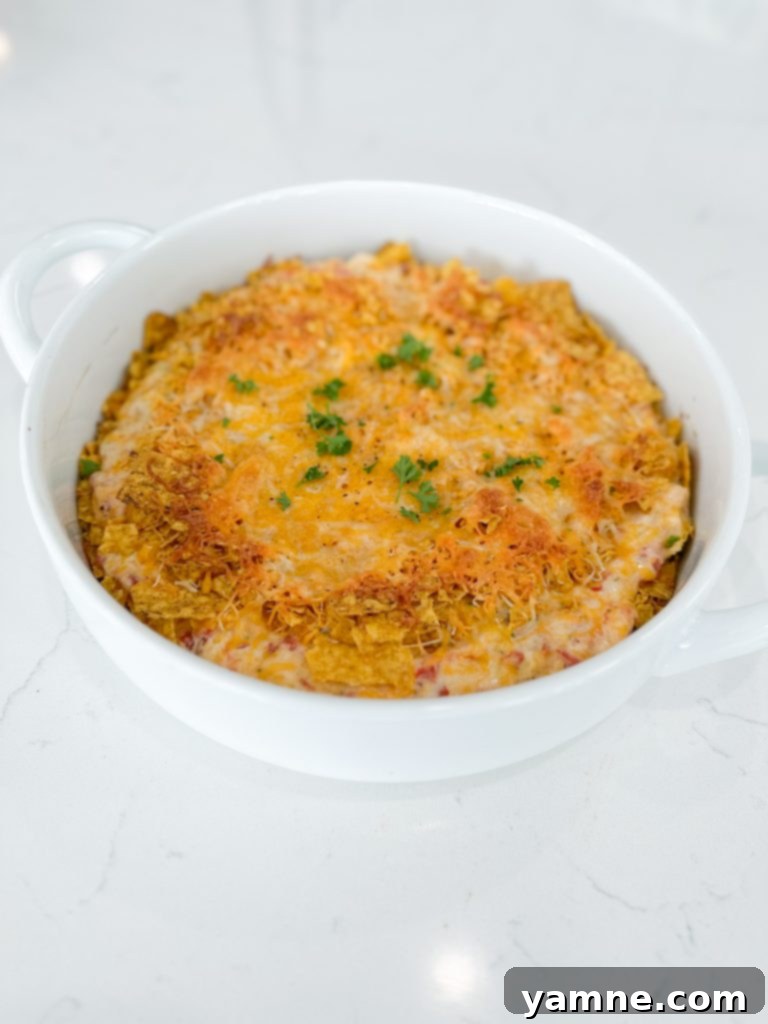 Baked Dorito Chicken Casserole in a baking dish, garnished with fresh cilantro