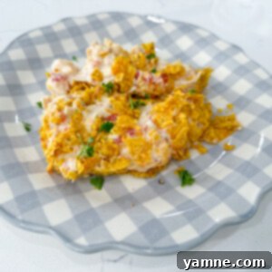 Dorito Chicken Casserole with a creamy, cheesy top