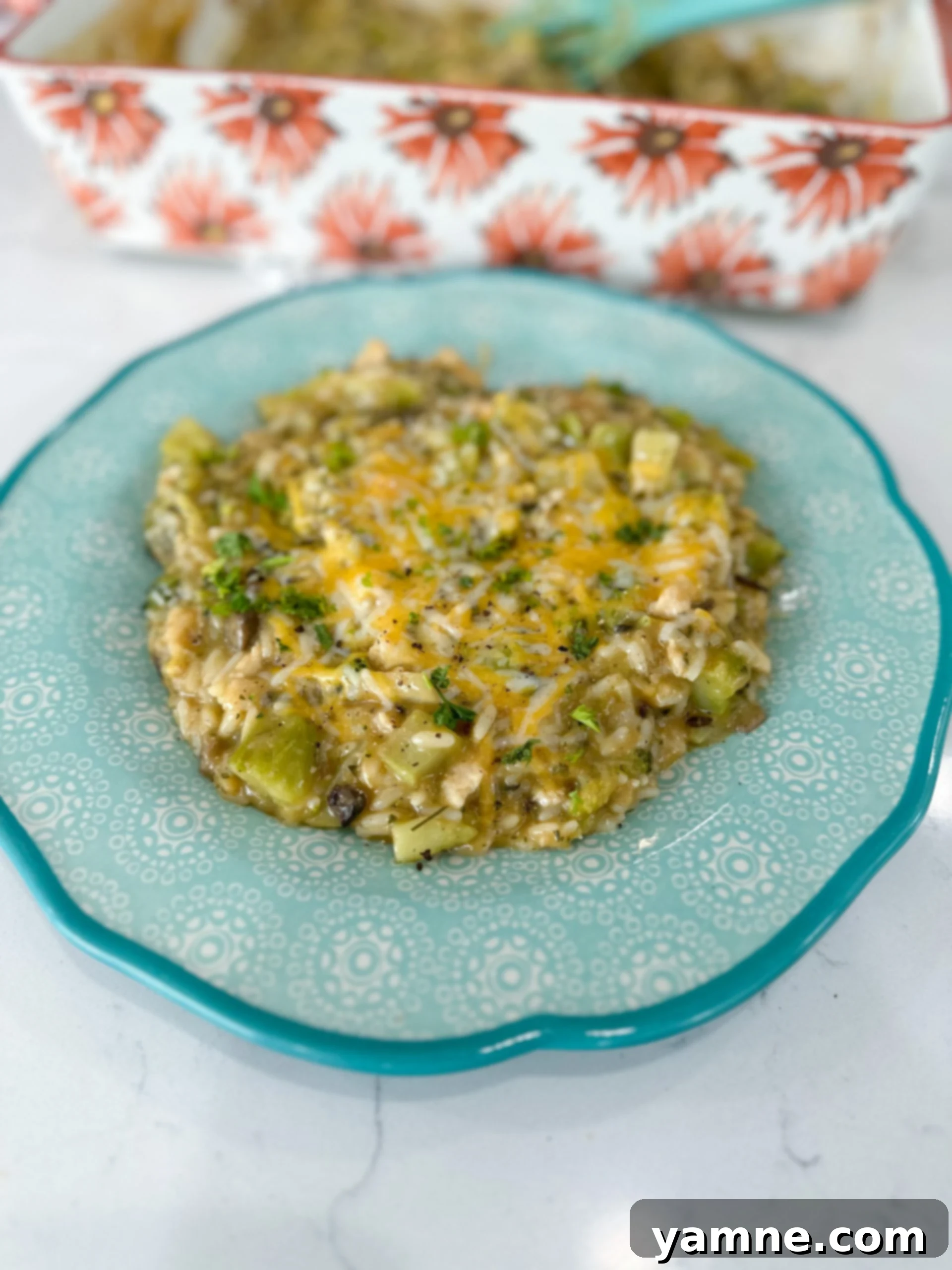 Creamy chicken and rice casserole with broccoli in a baking dish