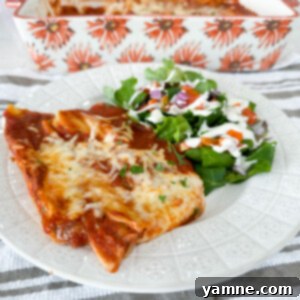 Easy Cheese Manicotti in a round bowl, garnished with fresh basil leaves.