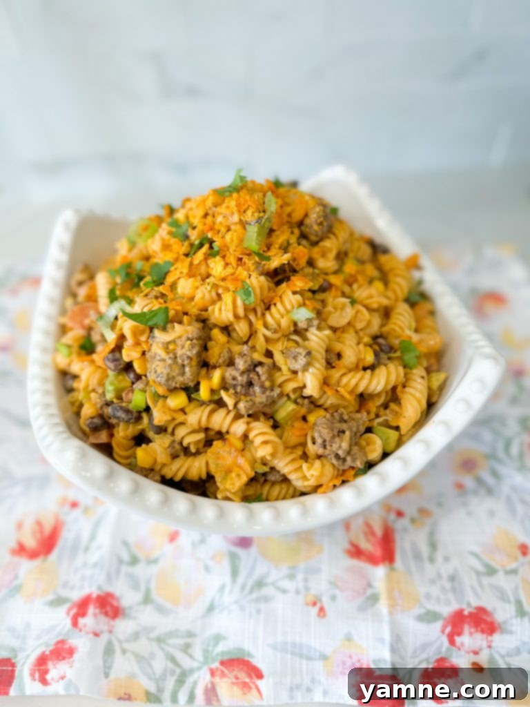 A top-down view of the Doritos Taco Pasta Salad, showing all the vibrant ingredients.