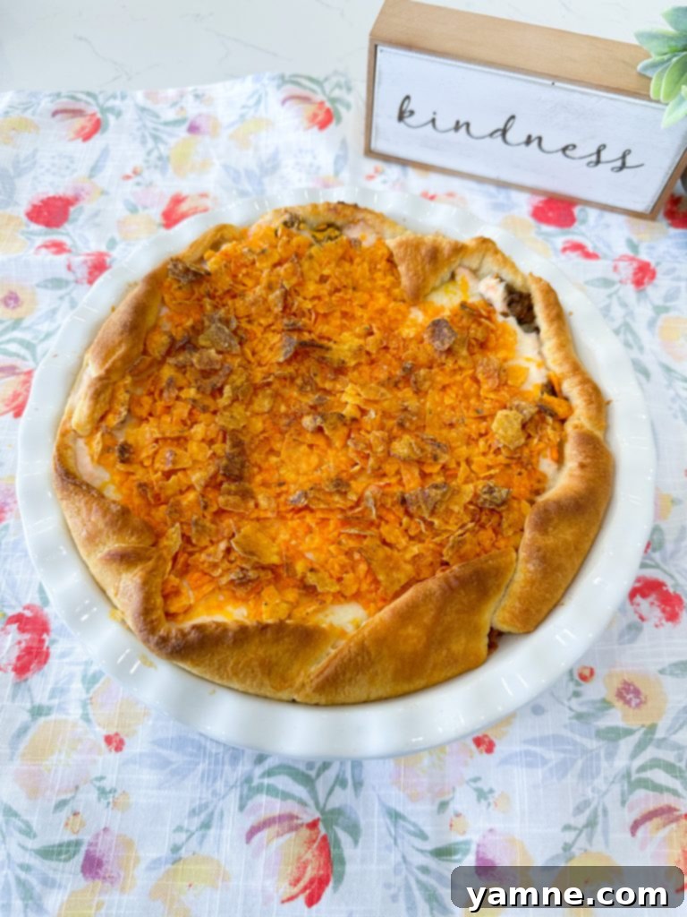 Doritos Taco Bake 10 Crescent dough folded over the taco pie filling to form a crust