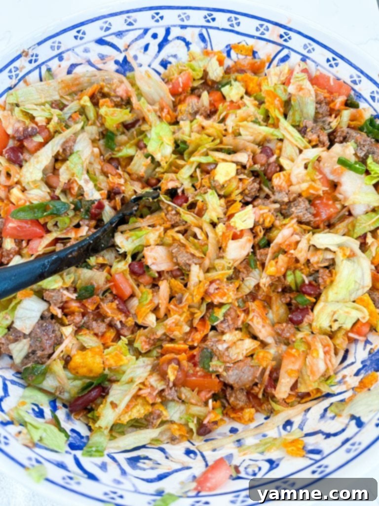 Crunchy Doritos Taco Salad 6 Close-up of taco salad with Catalina dressing and Doritos