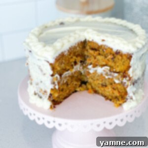 Grandma's homemade carrot cake, moist and delicious, topped with cream cheese frosting