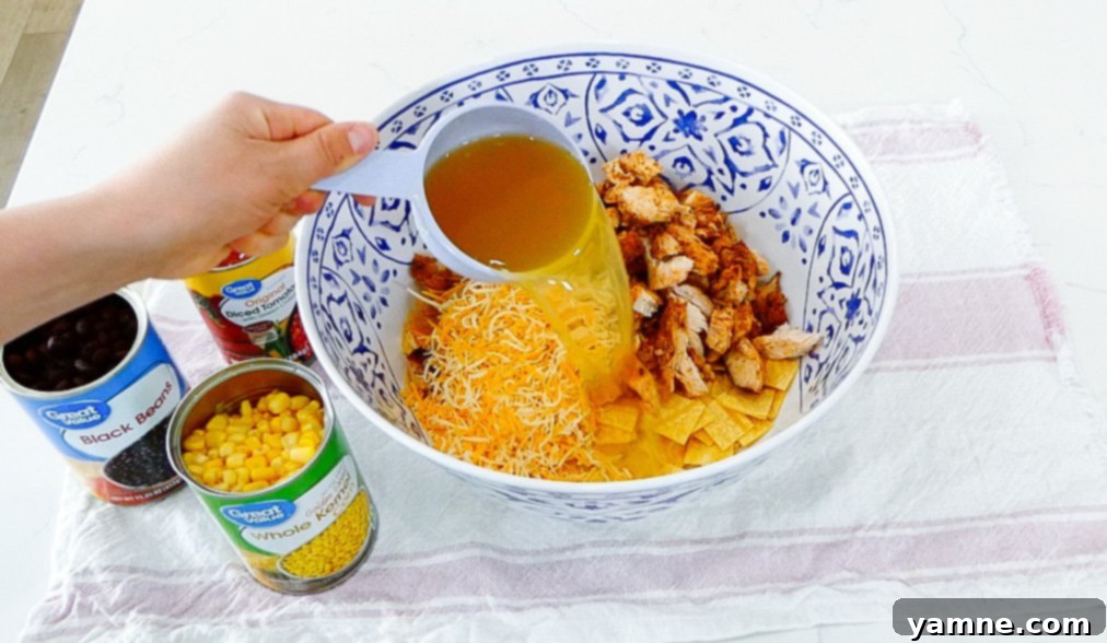 Southwestern Chicken Tortilla Bake 9 Mixed ingredients for Chicken Tortilla Casserole