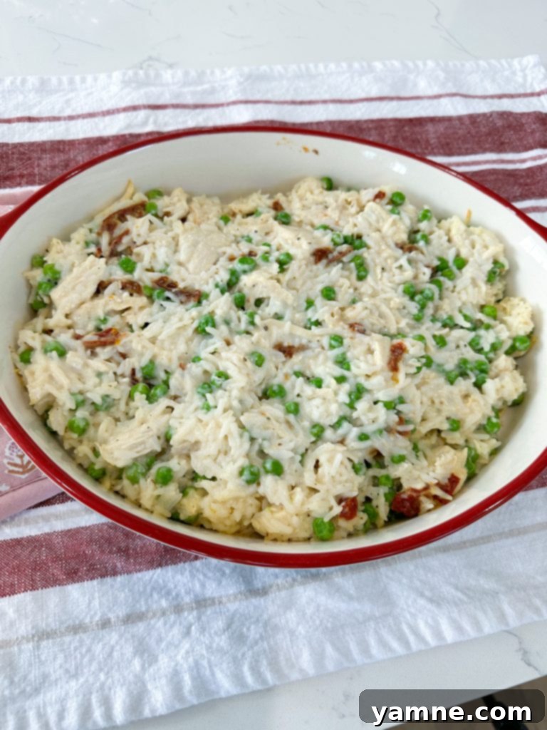 Casserole covered with aluminum foil, ready for initial baking.