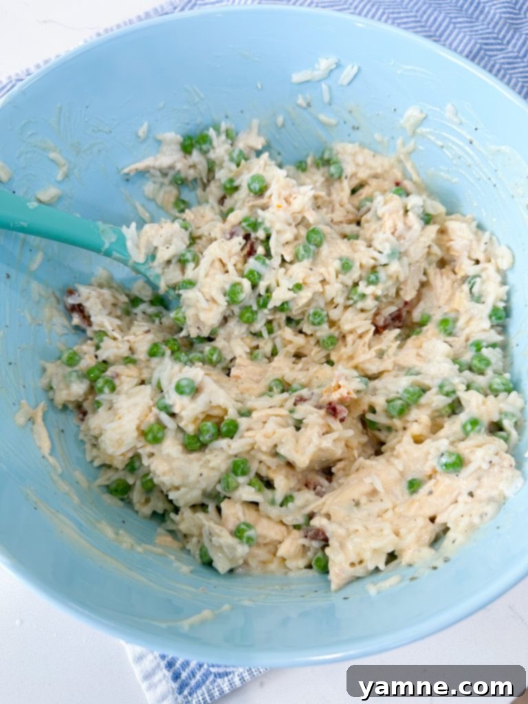 Close-up of all ingredients mixed thoroughly in a bowl for the casserole.