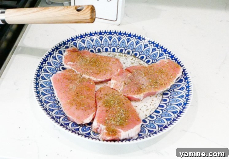 Plating the pork chops and beans