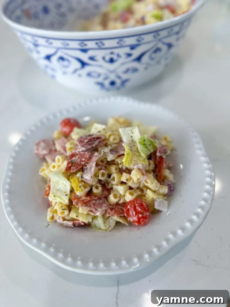 Serving Italian Grinder Pasta Salad