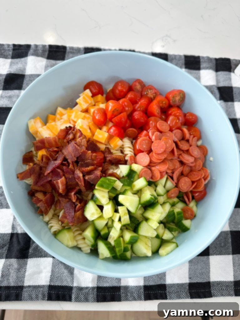 Tuscan Ranch Pasta Salad 7 Mixing the dressing ingredients in a bowl.