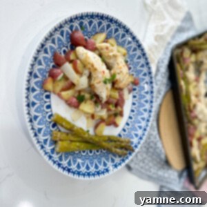 Sheet Pan Parmesan Garlic Chicken Tenders with Potatoes and Asparagus