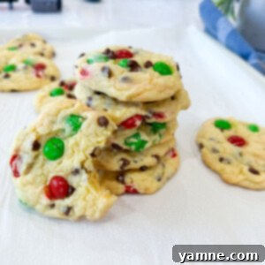 Super Easy M&M Chocolate Chip Cake Mix Cookies 2 Delicious and colorful Cake Mix Chocolate Chip M&M Cookies cooling on a rack