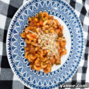 Delicious one-pot easy goulash with ground beef and pasta in a savory tomato sauce.