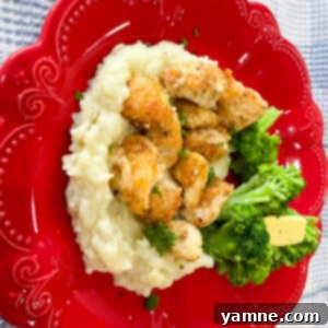 Tender Garlic Butter Chicken Bites 2 Golden brown garlic butter chicken bites in a skillet