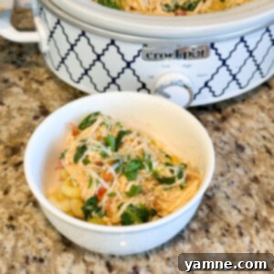 Tuscan Cream Chicken Crockpot 2 Slow Cooker Alfredo Tuscan Chicken with creamy sauce, spinach, and sun-dried tomatoes