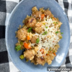 Effortless One-Pot Meatball & Rice 2 A delicious one-pot rice and meatball dinner, featuring savory meatballs, fluffy rice, and tender vegetables in a rich sauce.