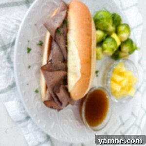 Delicious Easy French Dip Sandwich with au jus for dipping