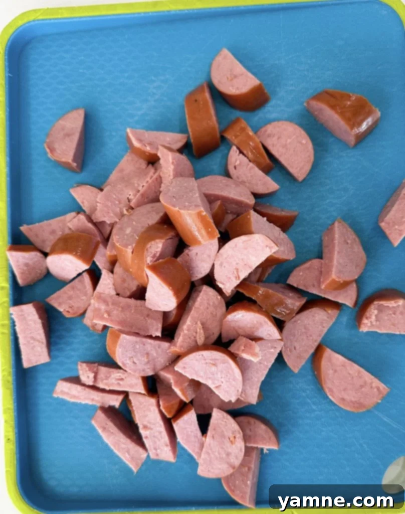 Five Dollar Smoked Sausage Mac and Cheese 4 Slicing Smoked Sausage